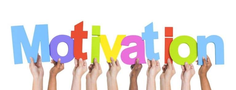 Multi-Ethnic Hands Holding Colorful Letters To Form Motivation