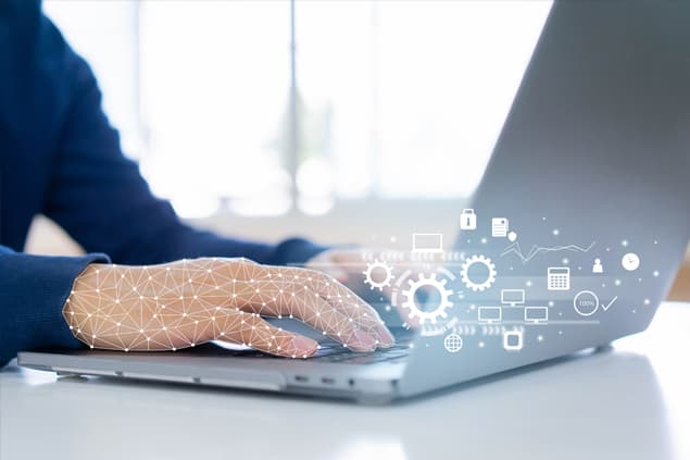A man using a laptop, with an overlay of icons relating to digital functionalities